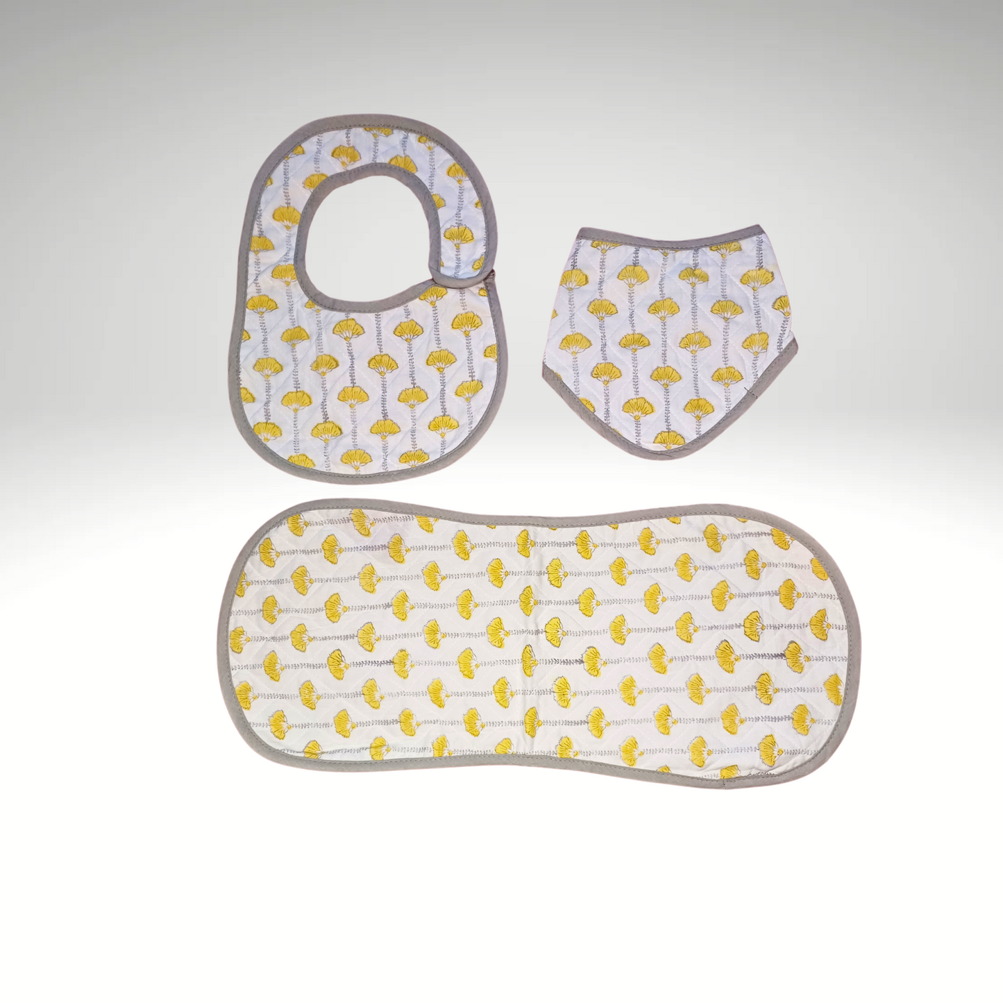 cream and yellow block print Quilt set